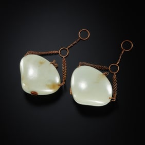 A PAIR OF HETIAN WHITE JADE SHELL PENDANTS, LIAO DYNASTY, CHINA