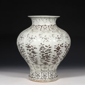 CHINESE YUAN DYNASTY UNDERGLAZE RED FLOWER PATTERN POMEGRANATE STATUE