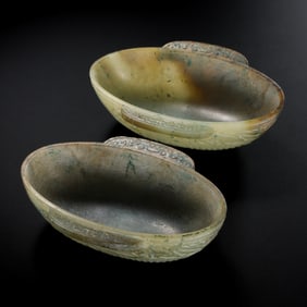 A PAIR OF CHINESE JADE EAR CUPS, HAN DYNASTY