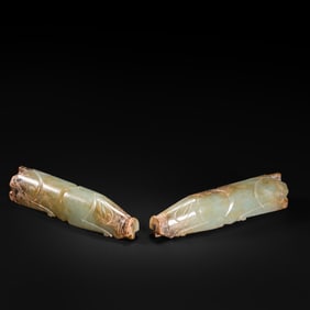 A PAIR OF JADE PIGS FROM THE HAN DYNASTY