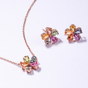 A SET OF 18K GOLD COLORED SAPPHIRES