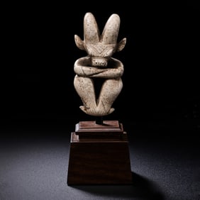 Chicken bone and white jade sun god statue of Hongshan culture in China during the Neolithic period
