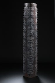 Chinese Neolithic jade cong with animal faces
