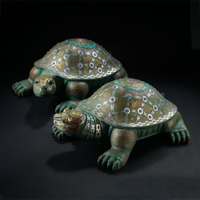 A pair of inlaid gold and silver turtles from the Chinese Warring States Period