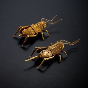 A pair of pure gold katydids from the Tang Dynasty of China