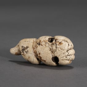 Chicken bone and white jade artifacts from the Hongshan culture of the Neolithic period in China