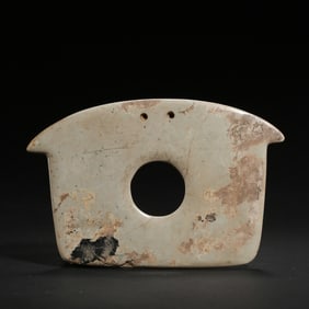 Chicken bone and white jade bi of Hongshan culture in China during the Neolithic period