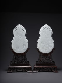 A pair of Chinese Qing dynasty rosewood inlaid with Hetian white jade gourd screens