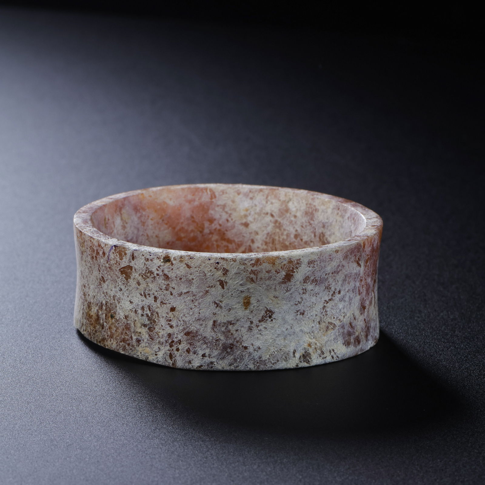 Jade artifacts of the Qijia culture in the Neolithic period of China: H. 2.3 cm. L. 6 cm. Weight. 45 gram.