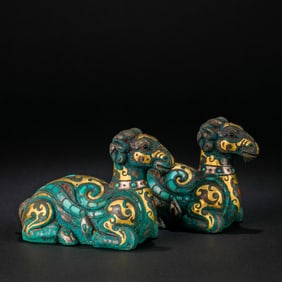 A pair of Chinese Warring States Period gold, silver and gemstone inlaid sheep weights
