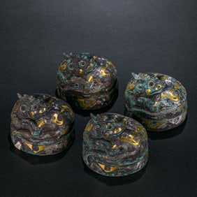 A group of Chinese Warring States Period inlaid gold and silver auspicious beasts