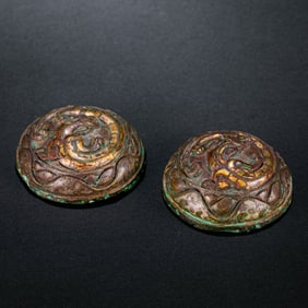 A pair of inlaid gold carvings from the Warring States Period in China