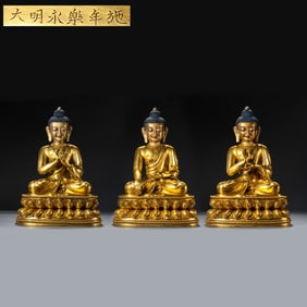 A group of Chinese Ming Dynasty Yongle period gilt bronze statues of the Three Buddhas