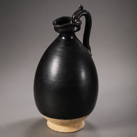 Chinese Tang Dynasty Gongxian kiln black glaze dragon handle pan mouth pot