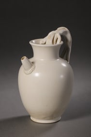 Chinese Tang Dynasty Xing kiln white porcelain lion handle pot