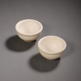 A pair of Chinese Tang Dynasty Gongxian kiln white porcelain cups