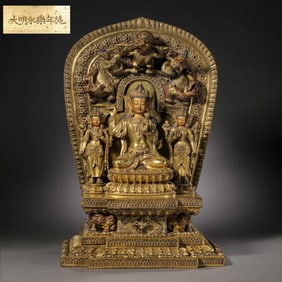 A Chinese gilt bronze statue of a seated Buddha from the Yongle period of the Ming Dynasty