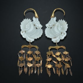A pair of Chinese Liao Dynasty gilt-bronze and Hetian jade earrings