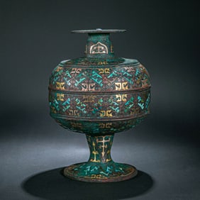 A tripod with a gold, silver and turquoise cover, China, Warring States Period