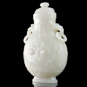 Chinese Qing Dynasty Hetian white jade animal face pattern double ring ear cover bottle