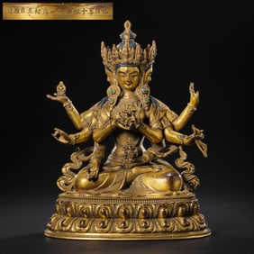 A Chinese gilt bronze statue of a seated Buddha from the Qianlong period of the Qing Dynasty