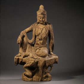 Chinese Song Dynasty wood carving of a seated Guanyin