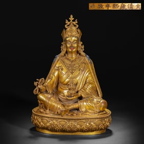 A Chinese gilt bronze statue of a seated Buddha from the Kangxi period of the Qing Dynasty