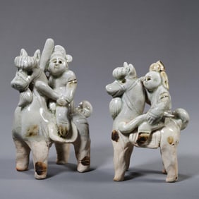 A group of Chinese Sui Dynasty Xiangzhou kiln celadon figures of foreigners riding horses