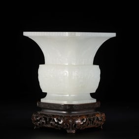 Chinese Qing Dynasty Hetian white jade square flower vase with animal faces