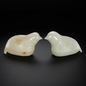 A pair of Chinese Qing Dynasty Hetian white jade quail lidded boxes
