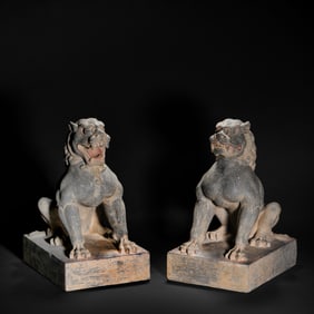 A pair of Chinese Tang Dynasty bluestone lion statues