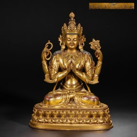 A Chinese gilt bronze statue of a seated Buddha from the Qianlong period of the Qing Dynasty