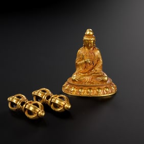 A group of pure gold Buddha statues and pure gold vajra from the Qing Dynasty, China
