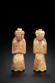 A pair of Chinese Han Dynasty jade figures