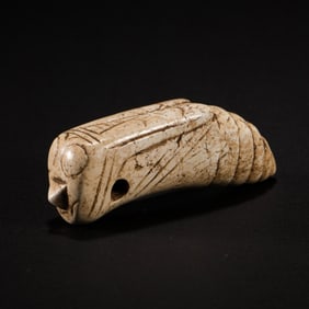 Chicken bone and white jade cicada from Hongshan culture in China's Neolithic period