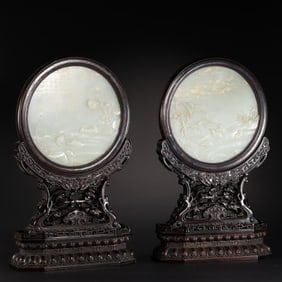A pair of Chinese Qing dynasty rosewood and Hetian white jade screens