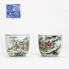 A pair of Chinese Qing dynasty Qianlong period enamel cups with story designs