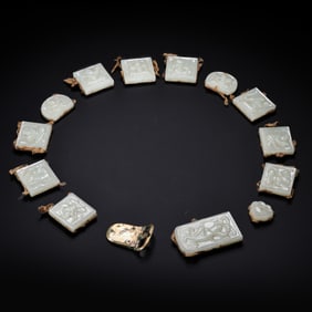 A set of Chinese Liao Dynasty Hetian white jade belt plates