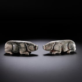A pair of Chinese Han Dynasty jade pig hands