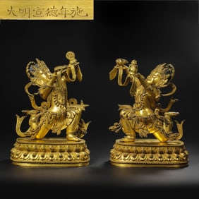 A pair of Chinese Ming Dynasty Xuande period gilt-bronze Buddha statues