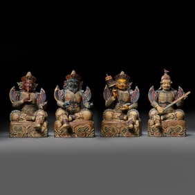 A group of Chinese Ming Dynasty painted statues of the Four Heavenly Kings