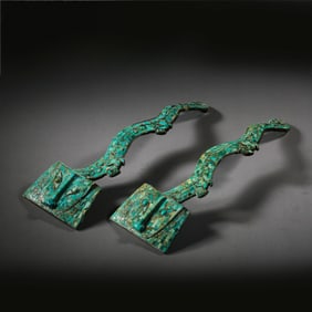 pair of Chinese Han Dynasty turquoise animal-faced chariot and horse figurines