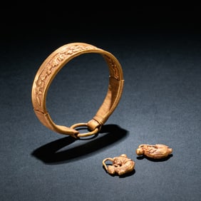 A set of ancient Chinese gilt bracelets and gilt earrings