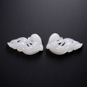 A pair of Hetian white jade flying figures from the Liao Dynasty, China
