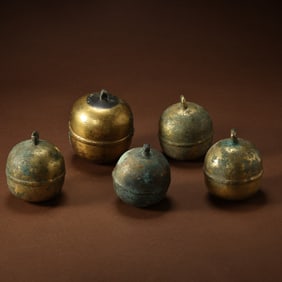 A set of Chinese Liao Dynasty gilt-bronze bells