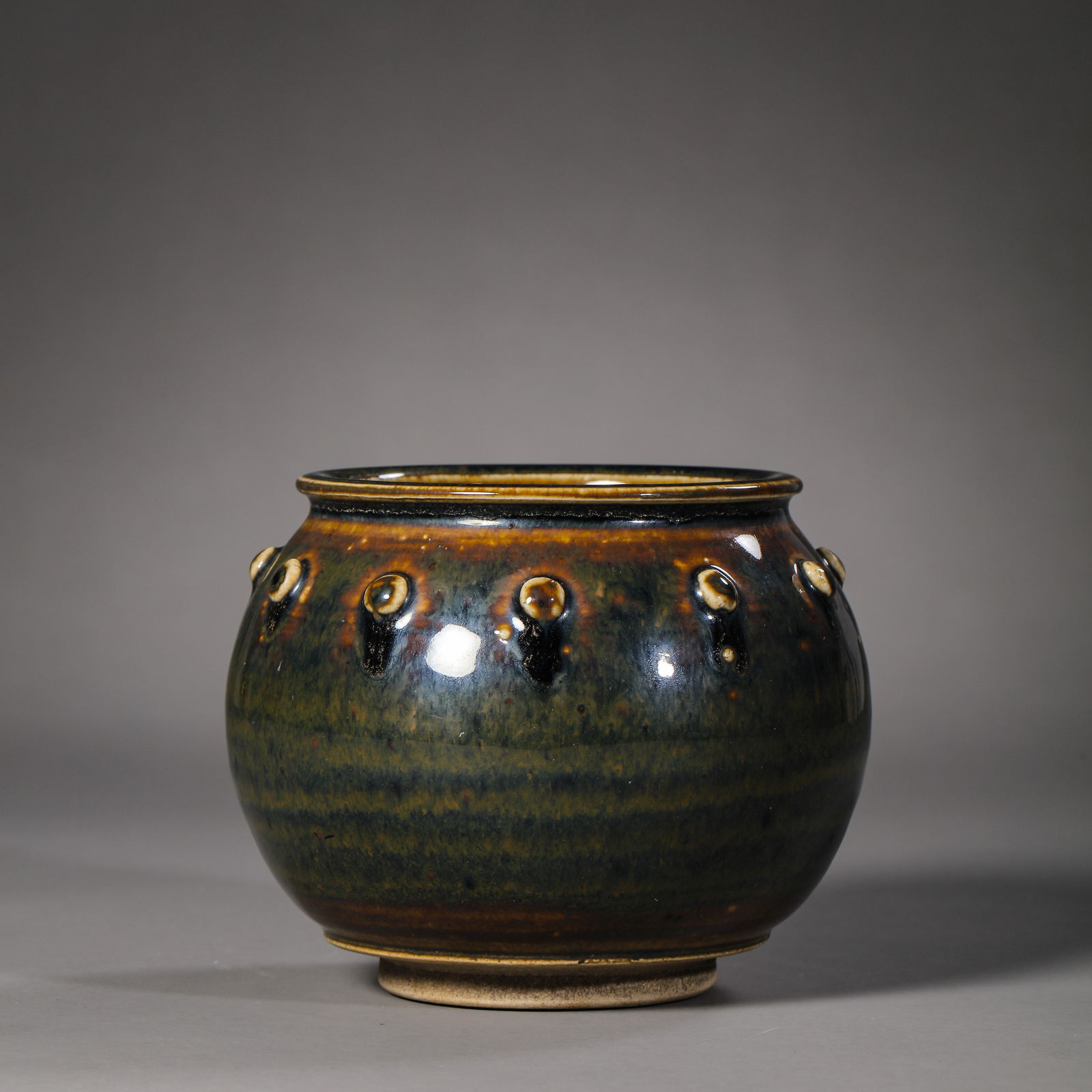 Chinese Northern Song Dynasty Cizhou kiln black glaze drum nail jar: H. 8.3 cm. Diam. 8 cm.