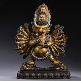 A Chinese gilt bronze statue of a six-character standing Buddha from the Qianlong period of the Qing