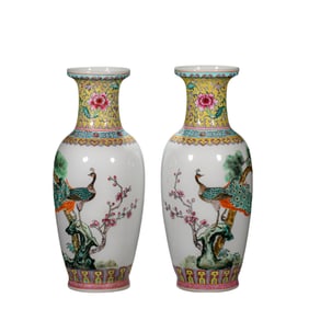 pair of Chinese Qing dynasty famille rose peacock-patterned vases