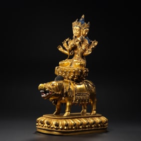 A Chinese Ming Dynasty Gilded Bronze Statue of Jiguang Buddha