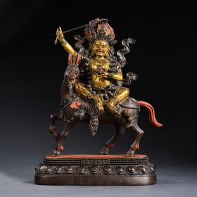 A Chinese gilt bronze statue of a six-character standing Buddha from the Qianlong period of the Qing